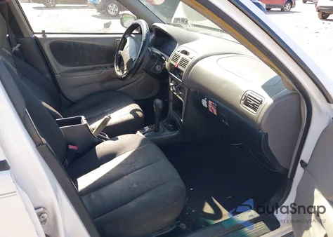 1998 Toyota Corolla Ce из США, поврежденный, VIN 2T1BR12E1WC067864